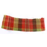 A small section of tartan accompanied by a letter claiming that it was worn by Bonnie Prince