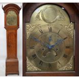 JOHN WOOD OF GRANTHAM; an oak cased eight day longcase clock, with brass arched dial,