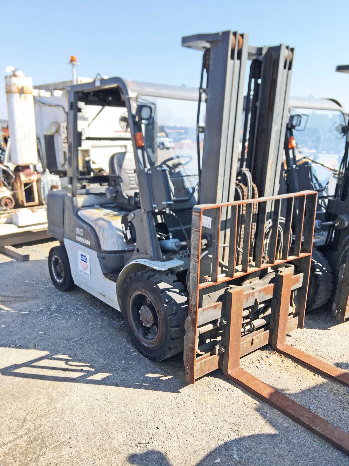 NISSAN 60 FORKLIFT W/CAB. SERIAL #9L0580