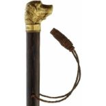 SpazierstockUm 1880. Schuss aus Edelholz. Der Griff in Form eines Hundekopfs aus ziselierter und