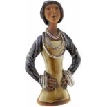 Figur "Benno Geiger"Mitte 20. Jh. Frei modellierte Keramikskulptur "Frau mit Halsringen". Partiell