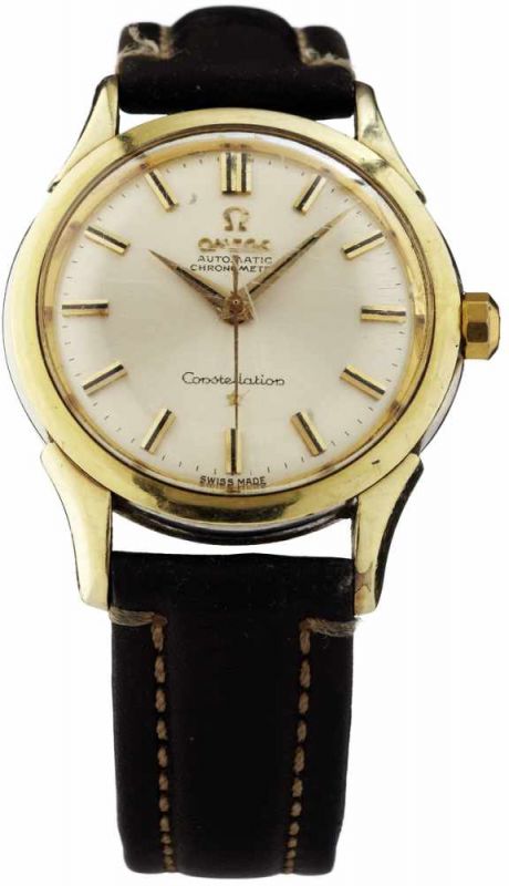 Armbanduhr "Omega"Um 1960. "Omega Constellation". Stahlgehäuse mit vergoldeten Bandanstössen und