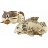 Zwei Netsuke von FischenJapan 20. Jh. Elfenbein. Wels mit Glücksperle und ein Haifisch. Signiert.