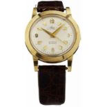 Armbanduhr "Alwa"Um 1960. Gehäuse aus Gelbgold 585. Boden verschraubt. Versilbertes, signiertes