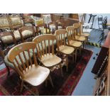 Six wooden kitchen chairs