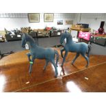 Two wooden horses