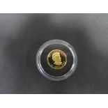 120th of an ounce pure gold coin of Canada with papers