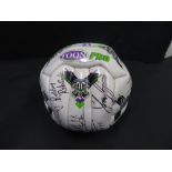 Newcastle United football signed by Sir Bobby Robson and team