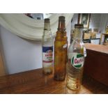 3 early oil bottles esso and castrol
