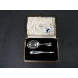 Silver spoon and pusher boxed