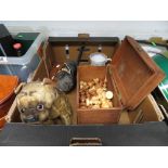box containing toy dogs and chess set