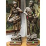 Pair of him and her spelter fisher folk 24 inches tall