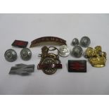 Box containing British rails and original cap badges and buttons