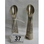 2 silver spill vases