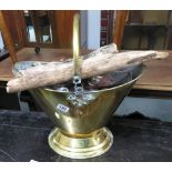 Brass coal bucket with logs