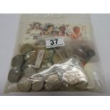 Bag containing two pound coins, one pound coins, 50p coins, commemorative coins