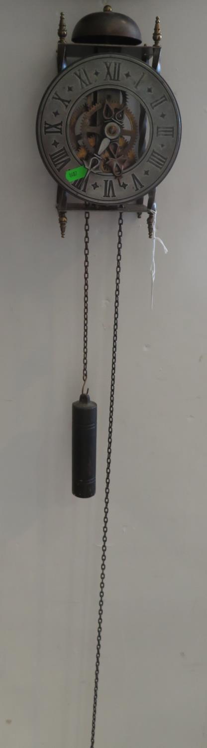 Iron wall clock - working but needs new pendulum