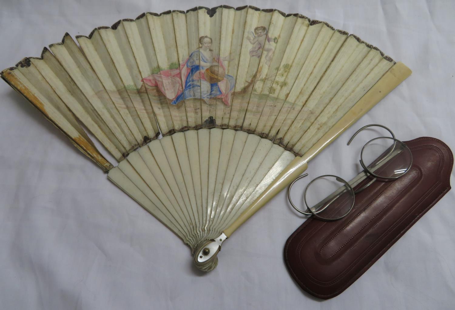 Early eye glasses and hand painted vellum and ivory fan