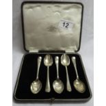 Box with 5x silver spoons