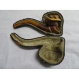 Meerschaum pipe of a suffragette with damaged amber mouthpiece
