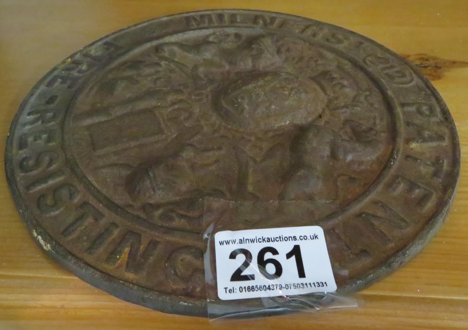 Metal plaque