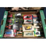 Box containing Matchbox cars and tractors