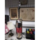 Chrome fire extinguisher converted into lamp