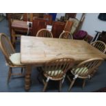 Pine farmhouse table with six chairs