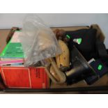 Box containing cameras, shoe lasts, binoculars and maps