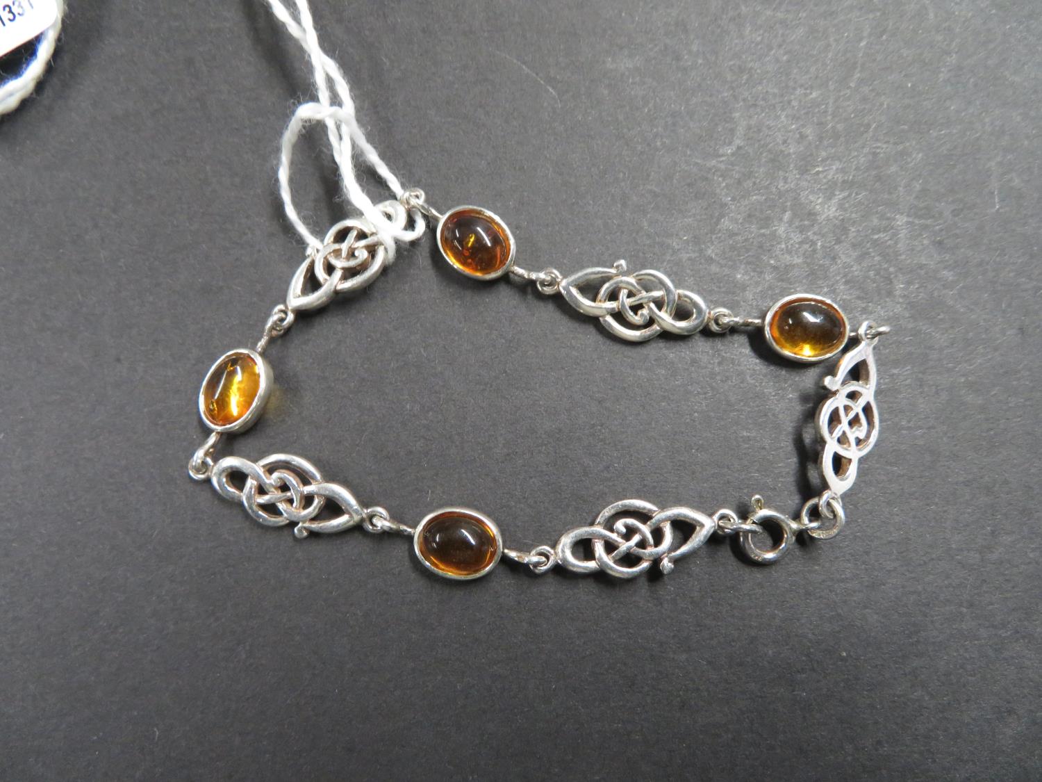 Celtic silver and amber bracelet