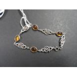 Celtic silver and amber bracelet