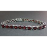 925 silver 28 individually mounted garnet bracelet