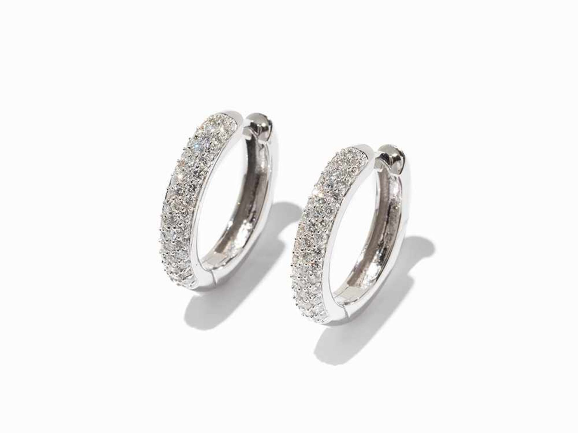 Pair of Creoles with 86 Diamonds of c. 0.90 ct., 18K White Gold 18 karat white gold Germany, 20th