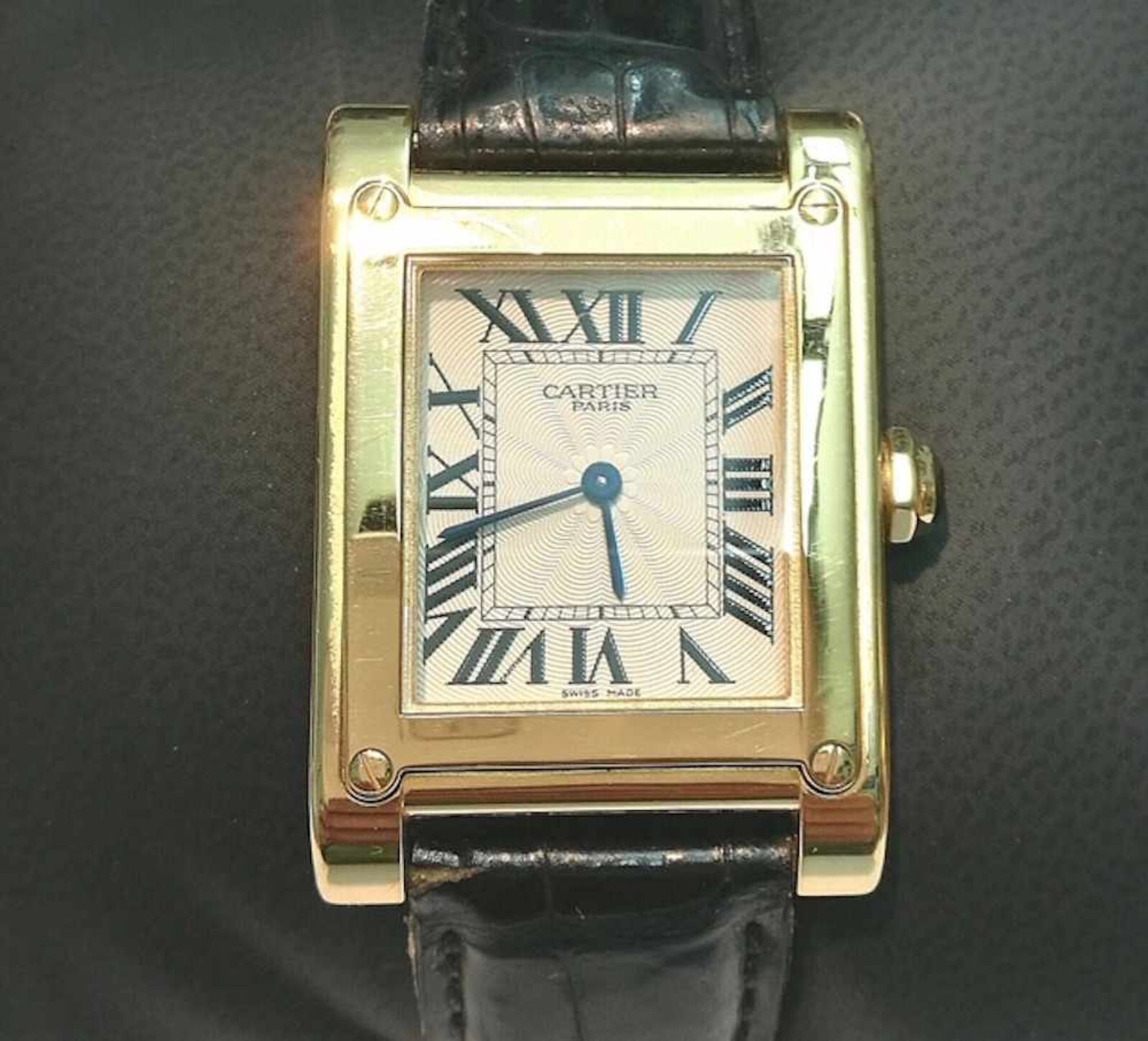 Cartier Tank A Vis Privee Ref. W1529451, Yellow Gold 750, with a blck alligator leather strap with