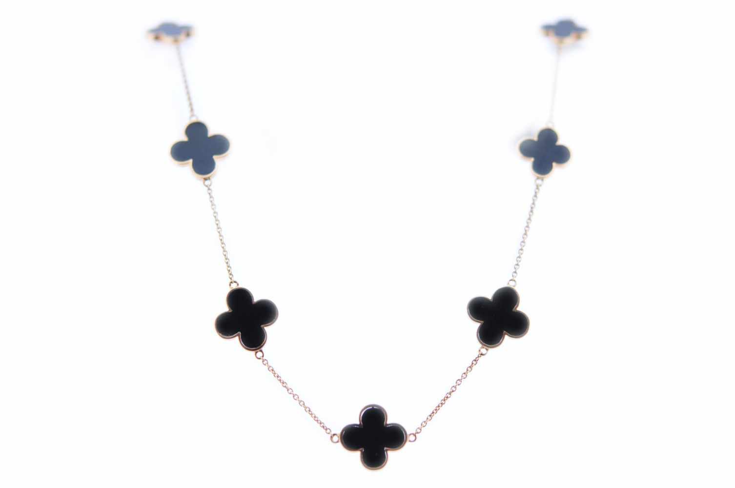 OnyxhalsketteRosegoldene 18 karätige Halskette mit Elementen in Kleeblattform, mit geschliffenem