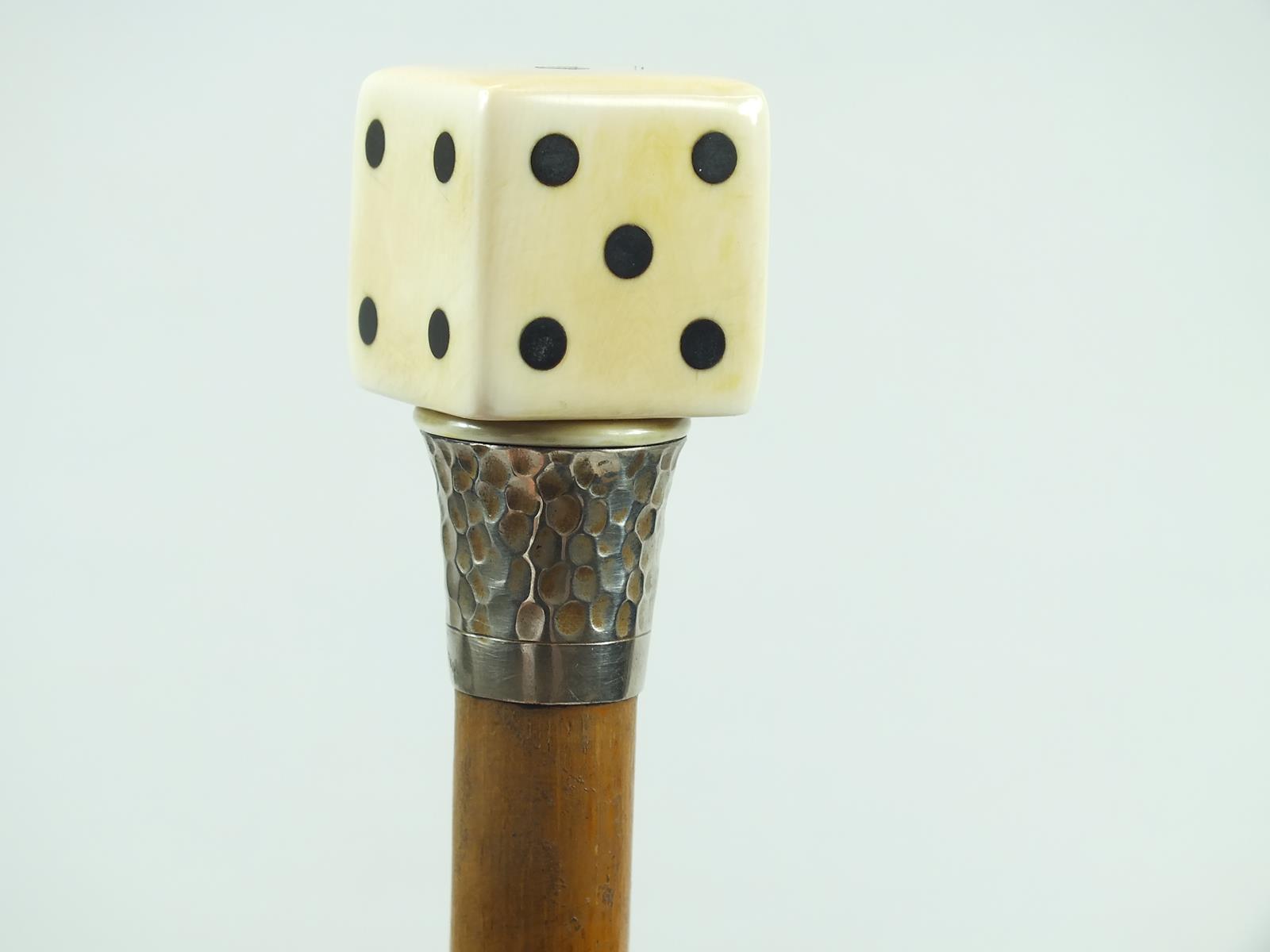 A 1930'S GAMER'S WALKING CANE,