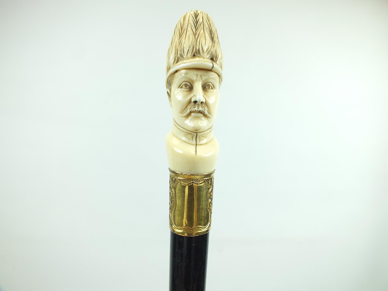 A LATE 19TH/EARLY 20TH CENTURY WALKING CANE, the pommel carved as the head of an officer - Image 2 of 9