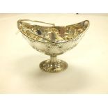 A Victorian silver navette shaped footed dish by Martin Hall & Co., Sheffield 1868, with swing