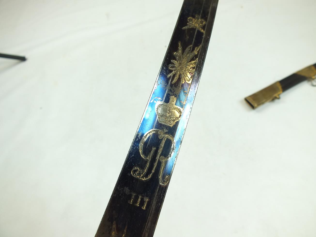 A GEORGIAN LIGHT COMPANY OFFICER'S SWORD, 82.5cm curved blade decorated with stands of arms, crowned - Image 17 of 21