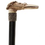 A LATE 19TH CENTURY WALKING STICK, the ivory handle carved as the head of a duck wearing bonnet