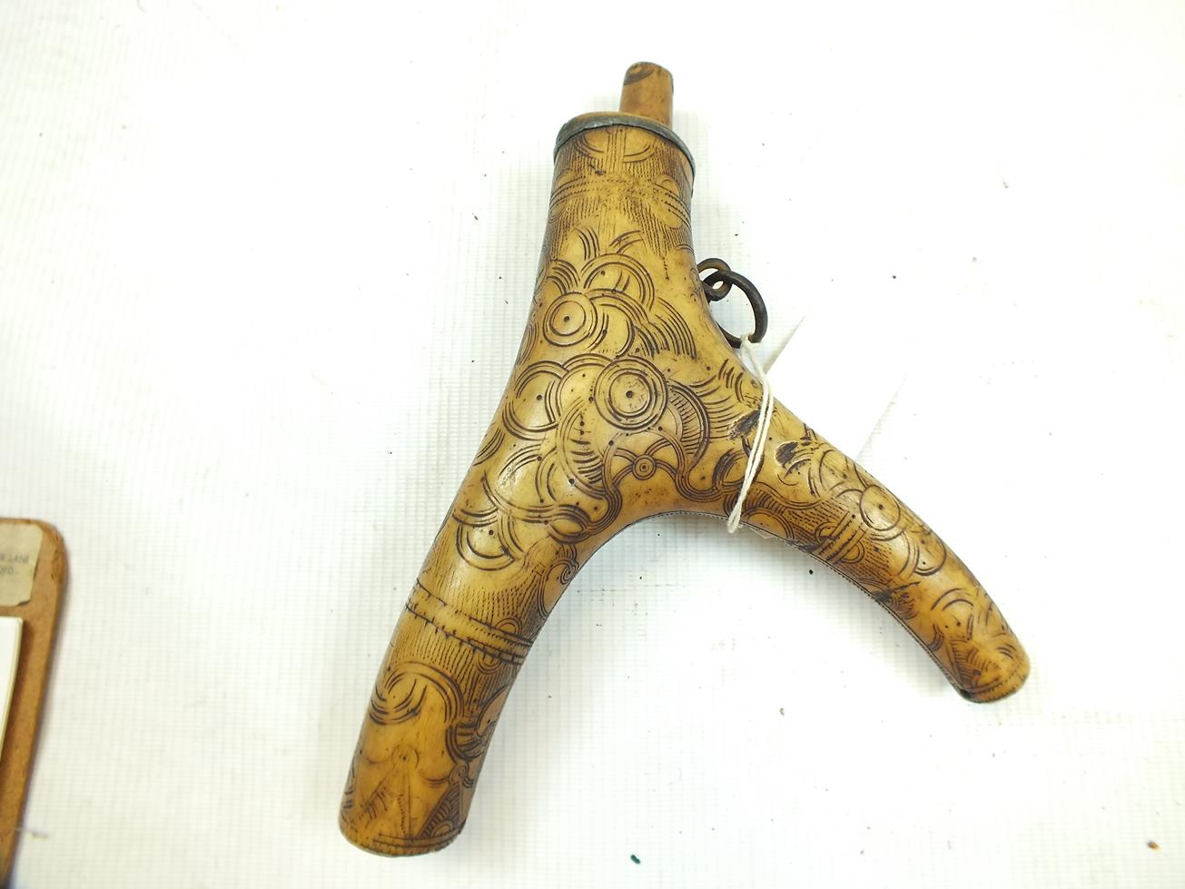 A 17TH CENTURY GERMAN POWDER FLASK, the two-branch stag horn body decorated with panels of geometric - Image 2 of 11