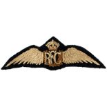 A PAIR OF ROYAL FLYING CORP CLOTH WINGS.