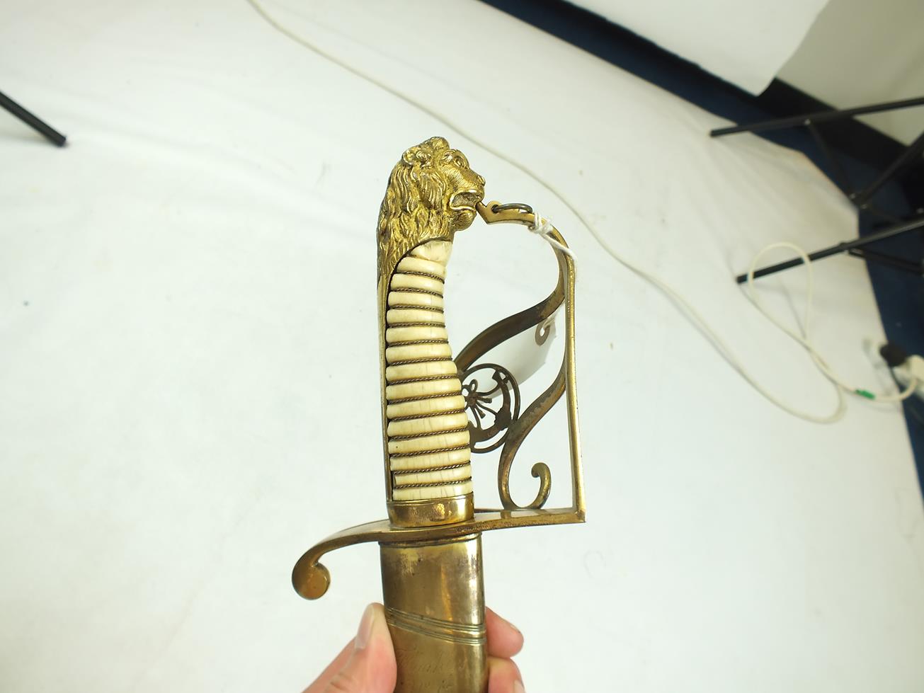 A GEORGIAN LIGHT COMPANY OFFICER'S SWORD, 82.5cm curved blade decorated with stands of arms, crowned - Image 7 of 21