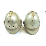 TWO SIXTH DRAGOON GUARDS TROOPER'S HELMETS, each comprising white metal skull with brass trim to