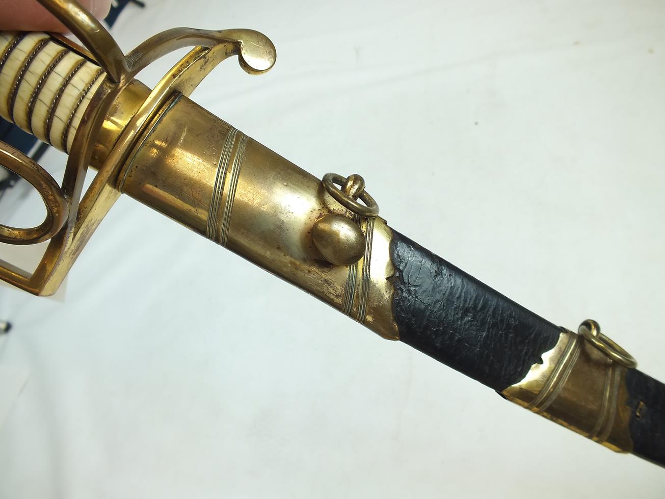 A GEORGIAN LIGHT COMPANY OFFICER'S SWORD, 82.5cm curved blade decorated with stands of arms, crowned - Image 13 of 21