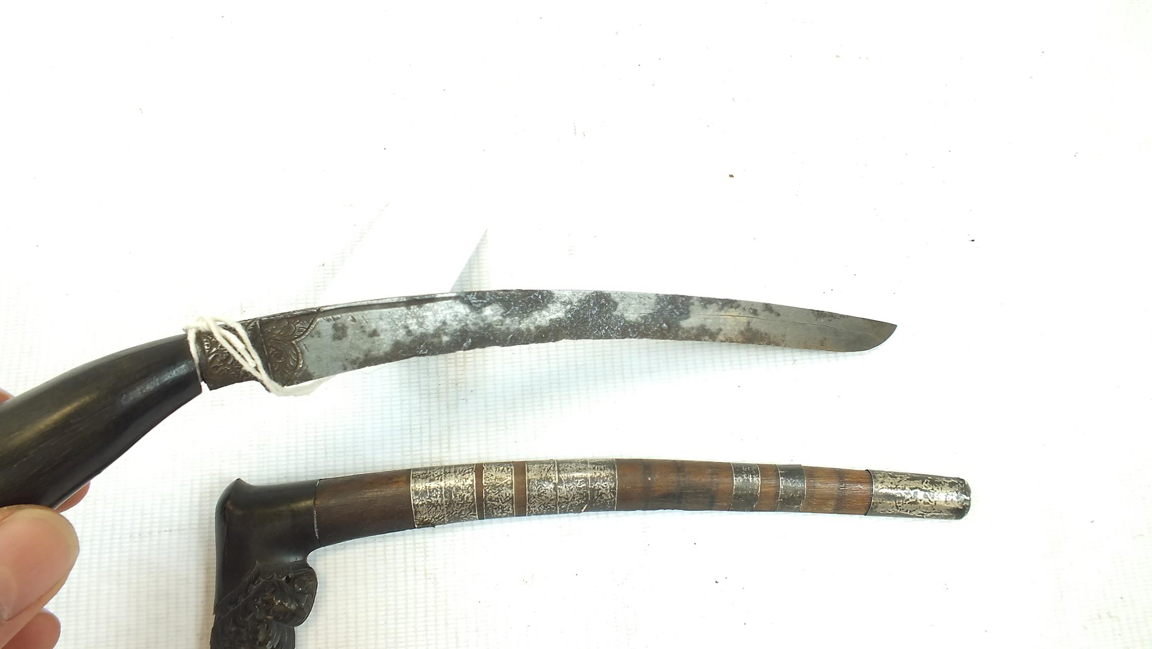 A RENCONG DAGGER, 21cm curved blade with foliate decoration at the forte, characteristic carved horn - Image 3 of 7