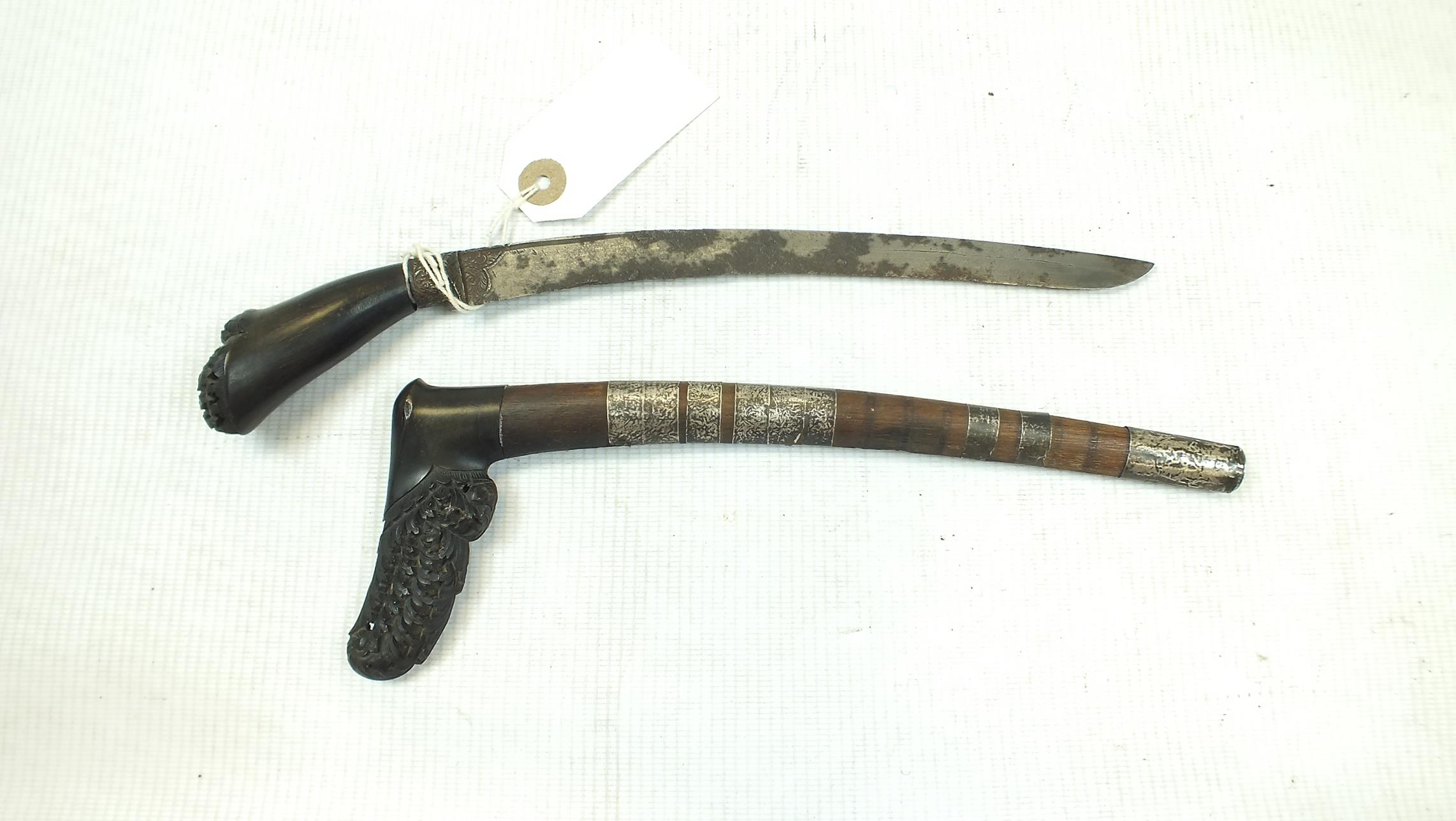A RENCONG DAGGER, 21cm curved blade with foliate decoration at the forte, characteristic carved horn - Image 2 of 7