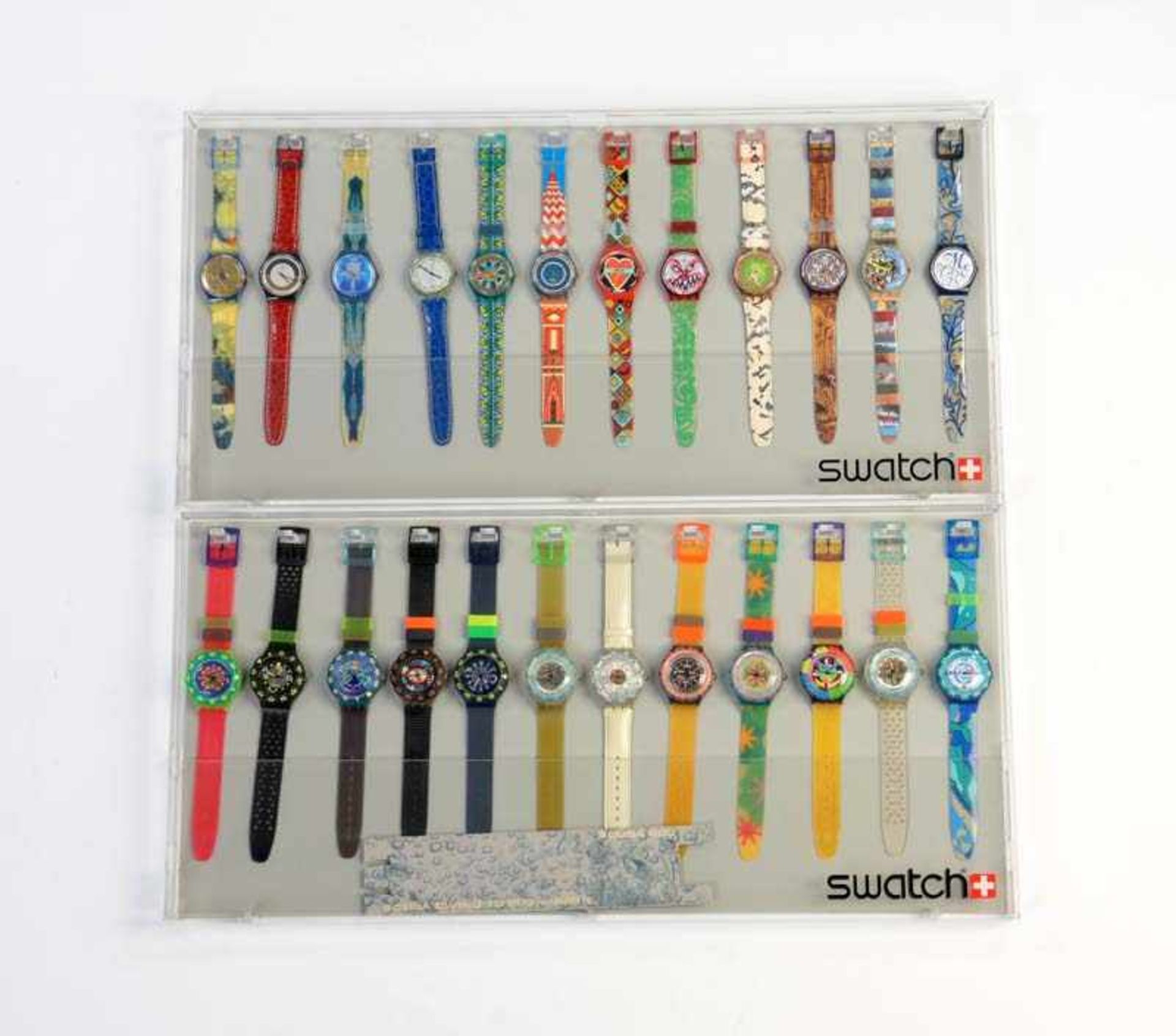 Swatch, 2 Displays mit 24 Uhren, Swiss made, neuwertig Swatch, 2 Displays with 24 Watches, Swiss