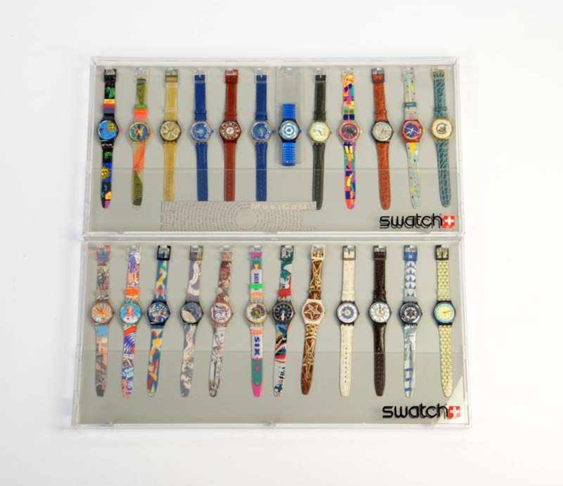 Swatch, 2 Displays mit 24 Uhren, Swiss made, neuwertig Swatch, 2 Displays with 24 Watches, Swiss