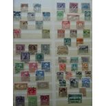 Briefmarken.-Sammlung von ca. 2000 Briefmarken aus aller Welt aus den Jahren um 1890-1960. Meist